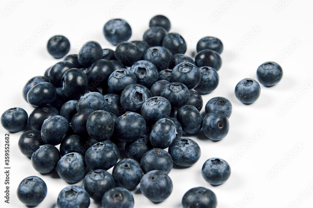 nature and healthy food concept. Top view of fresh blueberries isolated on white nature and healthy food concept. Top view of fresh blueberries isolated on white