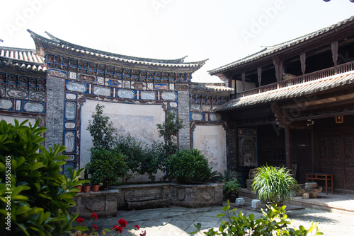  View of narrow street in rural traditional Chinese village. Typical street scene in Chinese villages photo