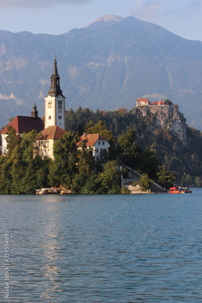 The Church, Castle and the mountains in the Bled Lake in Slovenia