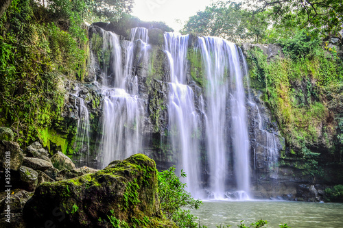 Beautiful Waterfall Catarata Llanos de Cortes in Guanacaste, Costa Rica inmersed in the tropical rainforest  photo