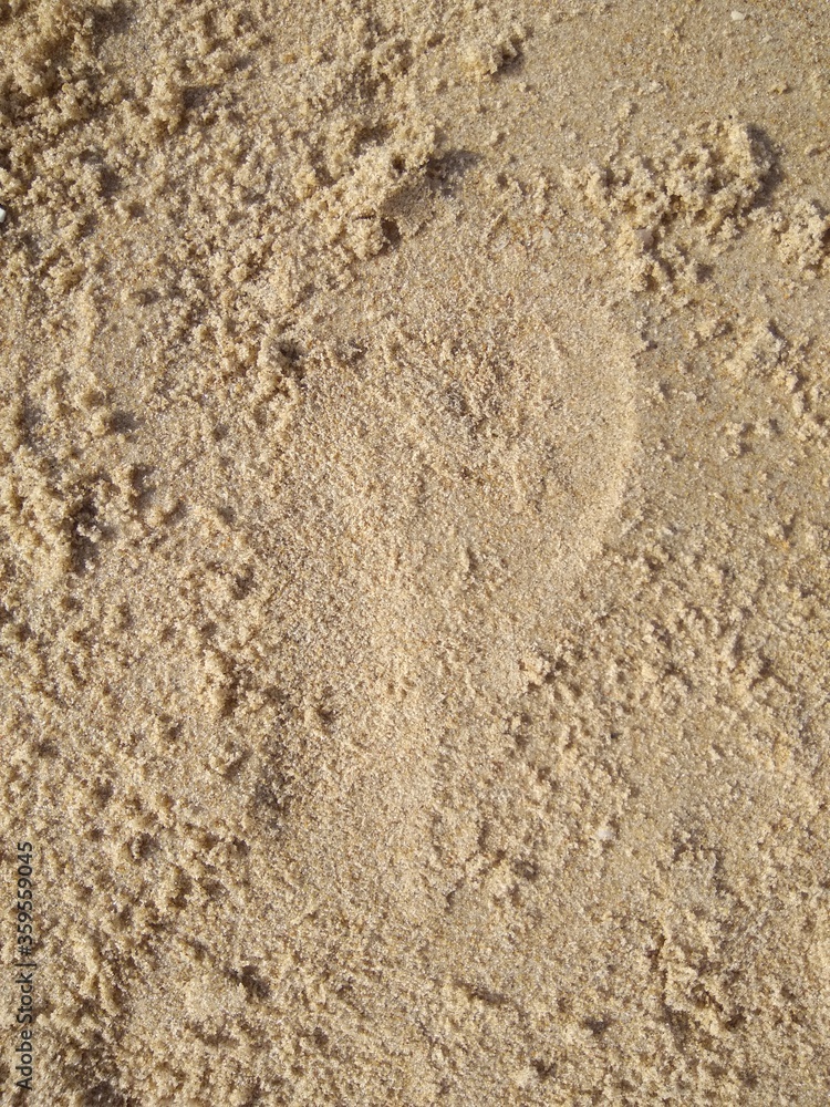 The structure of the sand on the Mediterranean coast close-up, abstraction. The structure of the sand on the Mediterranean coast close-up, abstraction.