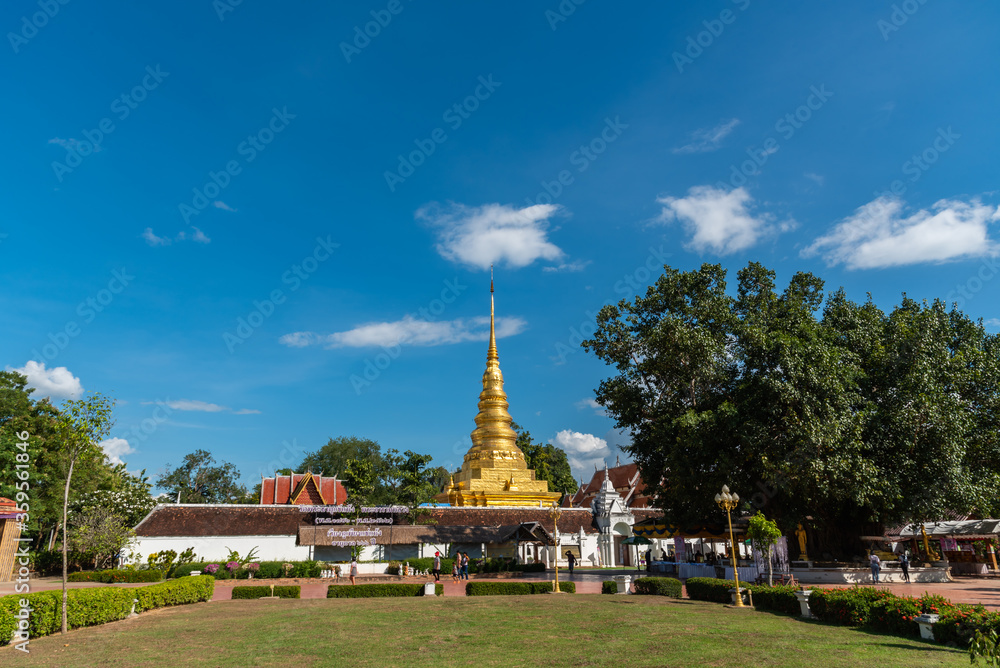 The golden pagoda with blue sky background.