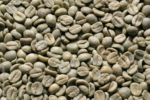Fotografie Rohe ungeröstete grüne Kaffeebonen Rohkaffeebohnen
roh Kaffee Hintergrund
