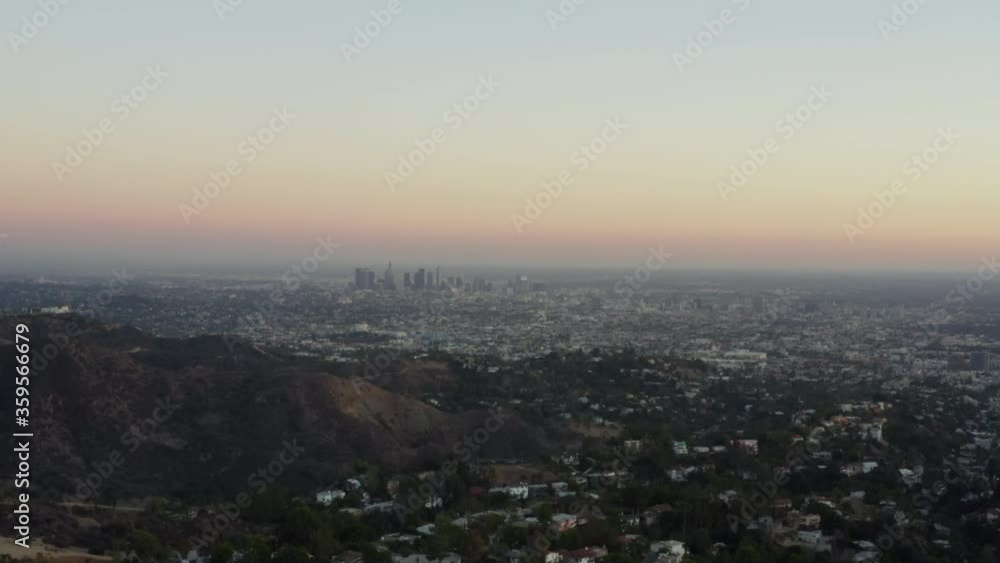 AERIAL: View over Los Angeles in Hollywood Hills at Sunset, Los Angeles, California AERIAL: View over Los Angeles in Hollywood Hills at Sunset, Los Angeles, California