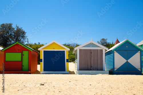 Colorful little beach house on a beach in australia © pink candy