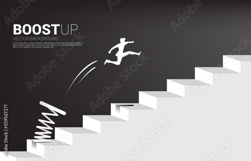 silhouette of businessman jumping to pass step with springboard,. Business Concept of targeting and customer.route to success.