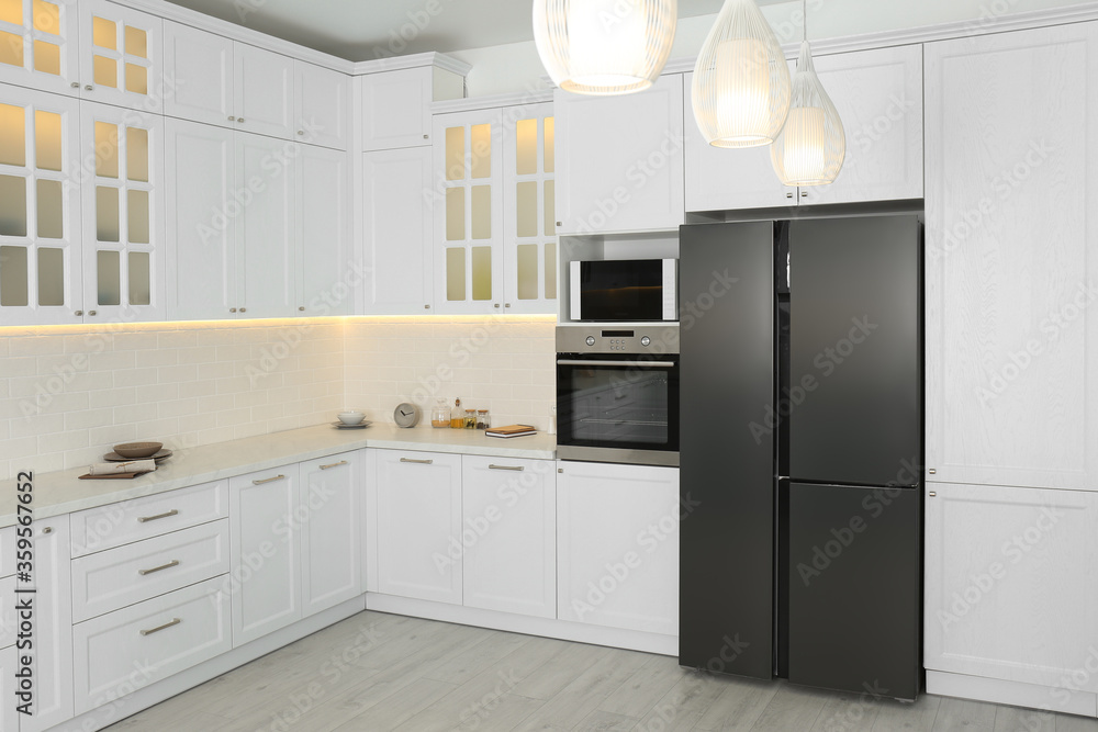 Beautiful kitchen interior with new stylish furniture Beautiful kitchen interior with new stylish furniture