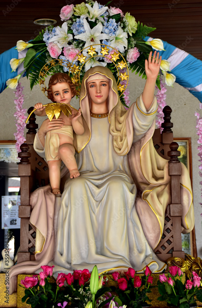 Statue of Our lady and child Jesus in catholic church, Thailand. selective focus.