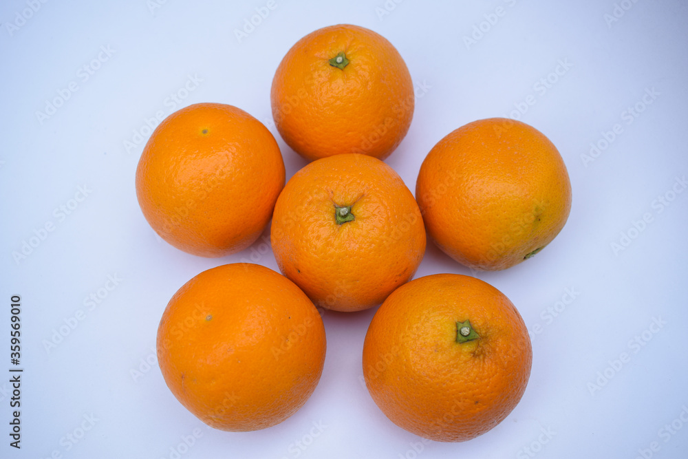 Mandarin fruit Heap on white background. Fresh fruits from India Asia Mandarin fruit Heap on white background. Fresh fruits from India Asia
