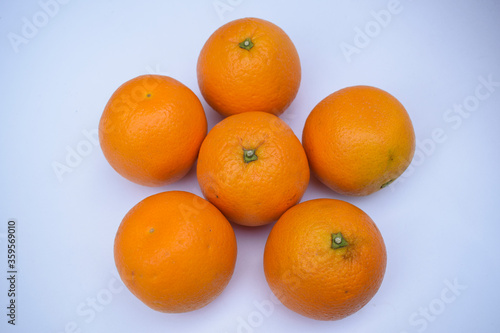 Mandarin fruit Heap on white background. Fresh fruits from India Asia