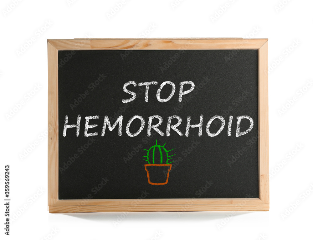 Small blackboard with phrase STOP HEMORRHOID isolated on white