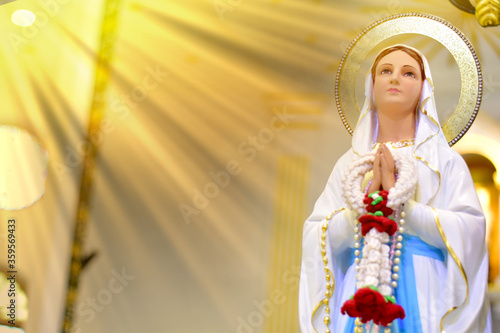 Close up of Statue of Our lady of grace virgin Mary in the church, Thailand. selective focus. photo