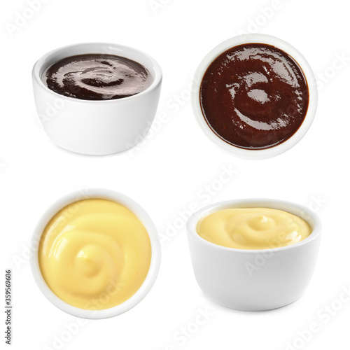 Set of different delicious sauces on white background