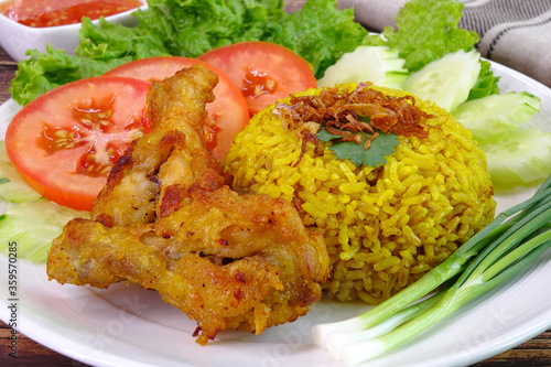 Briyani rice with crispy fried chicken wings, Halal food / Muslim food photo