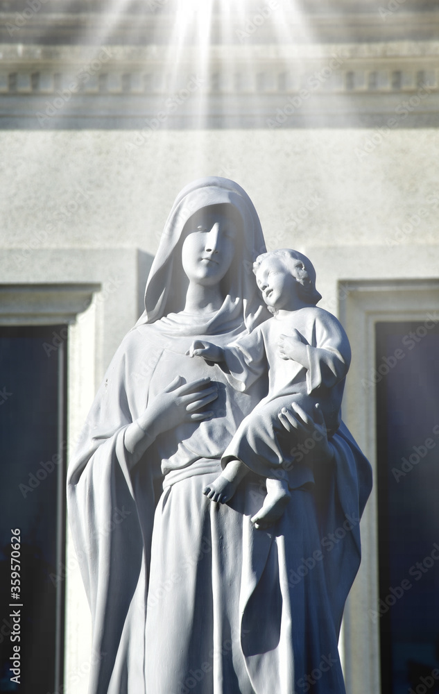 Naklejka premium Statue of Our lady and child Jesus in catholic church, Thailand. selective focus.