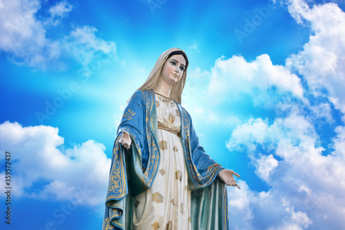 Wallpaper Mural Our lady of grace virgin Mary with Bright Blue Sky and beautiful clouds with abstract colored background and wallpaper Torontodigital.ca
