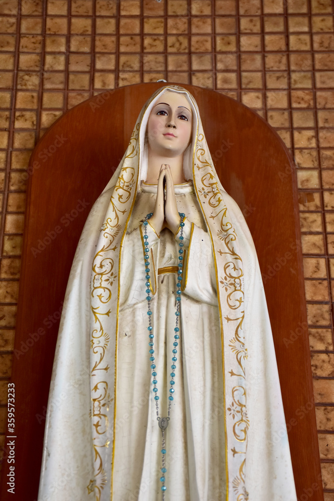 Close up of Statue of Our lady of grace virgin Mary in the church, Thailand. selective focus. Close up of Statue of Our lady of grace virgin Mary in the church, Thailand. selective focus.
