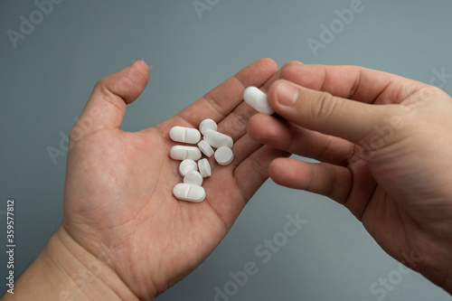 hand holding variety of remedies