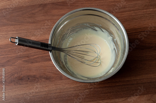 stainless steel bowl with manual hand egg beater