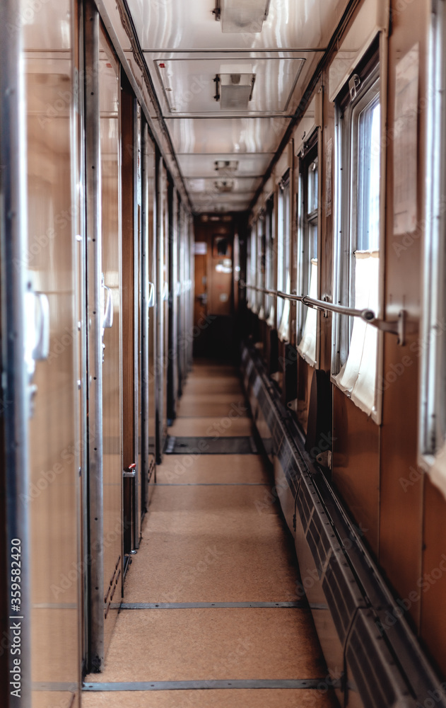 Interior of a long-distance train in Russia. Long corridor