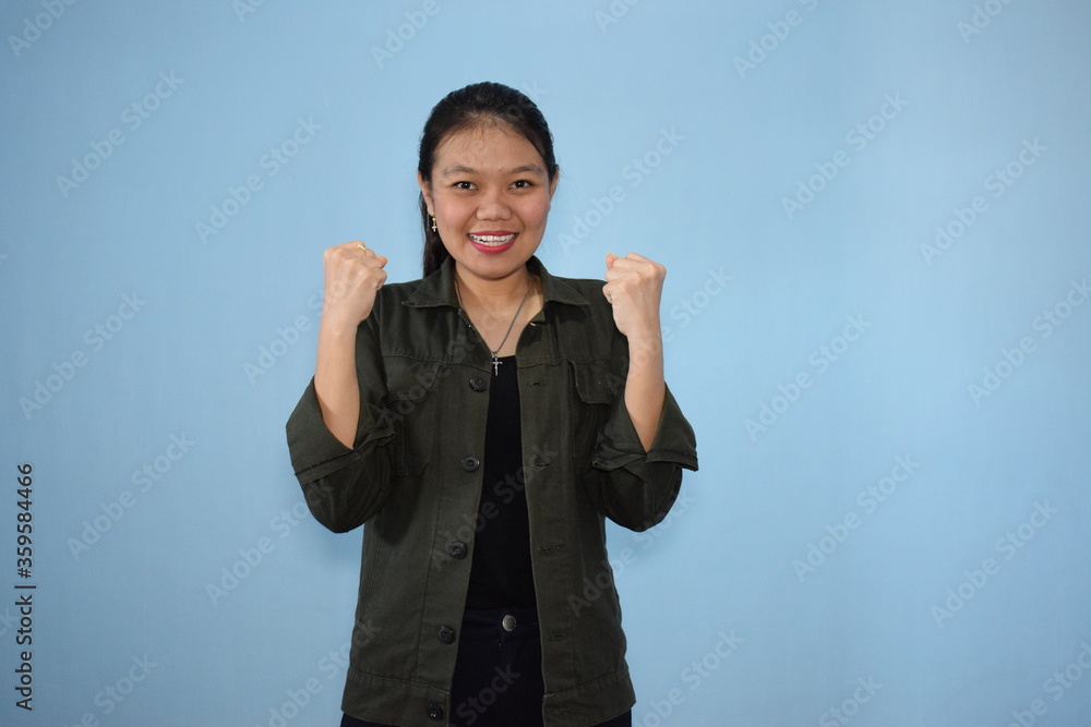Portrait of Indonesian Woman Using Black shirt and jacket with isolated background Portrait of Indonesian Woman Using Black shirt and jacket with isolated background