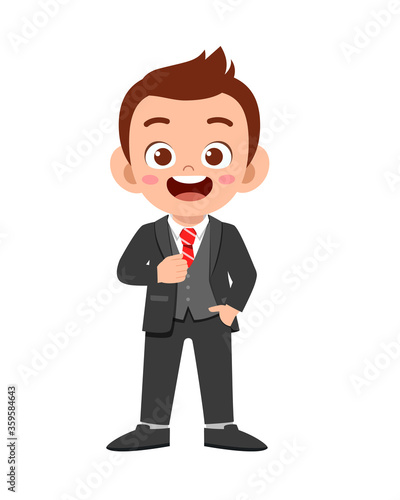 happy cute kid boy wear suit blazer tuxedo