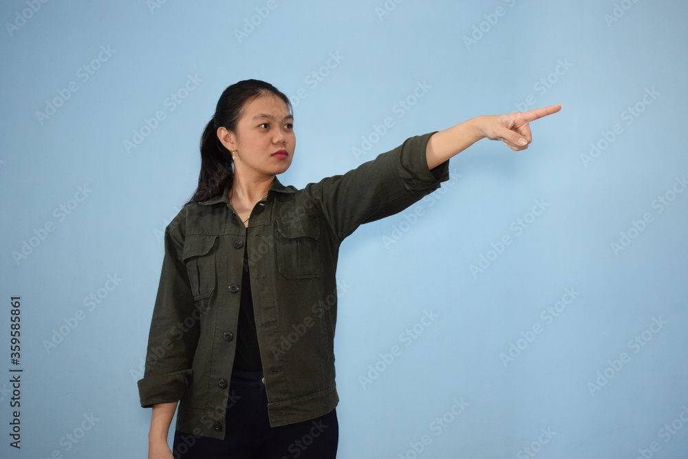 Portrait of Indonesian Woman Using Black shirt and jacket with isolated background Portrait of Indonesian Woman Using Black shirt and jacket with isolated background
