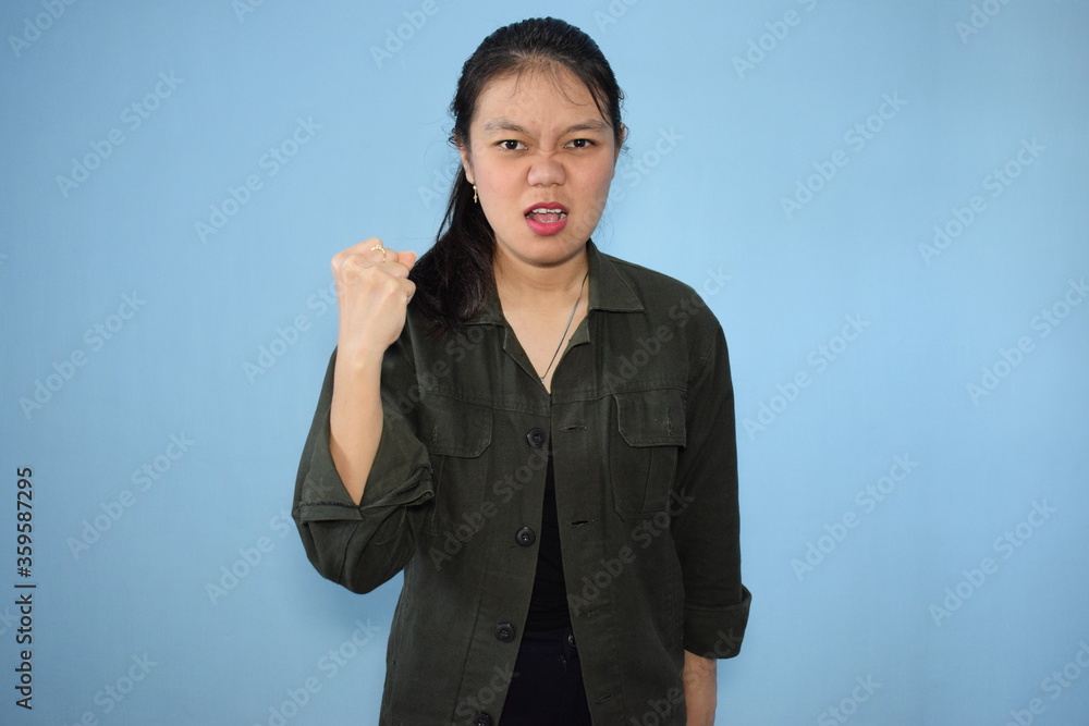 Portrait of Indonesian Woman Using Black shirt and jacket with isolated background Portrait of Indonesian Woman Using Black shirt and jacket with isolated background