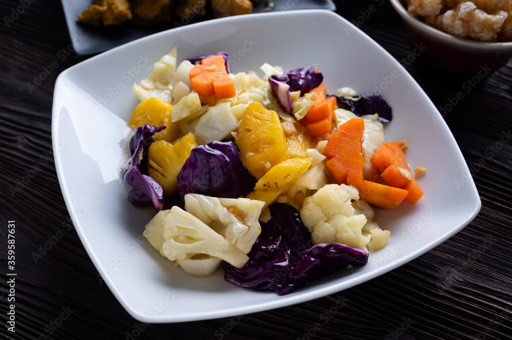 Stir-fried Mixed Vegetables carrot , cabbage and pineapple. Stir-fried Mixed Vegetables carrot , cabbage and pineapple.