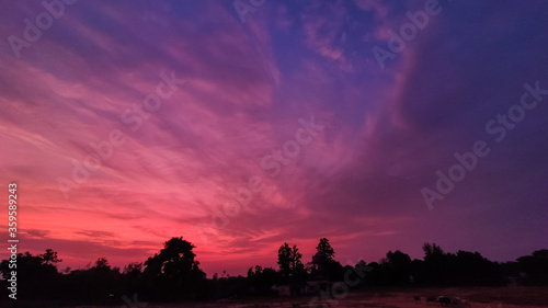 beautiful pink clouds with blue sky on evening at country side area