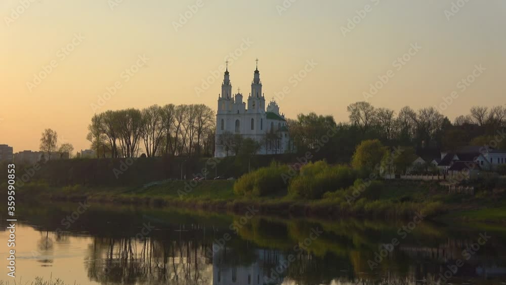 Ancient St. Sophia Cathedral and the Western Dvina river in the spring twilight. Polotsk, Belarus Ancient St. Sophia Cathedral and the Western Dvina river in the spring twilight. Polotsk, Belarus