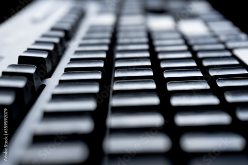 Close-up of a black PC keyboard key of an empty laptop computer laptop