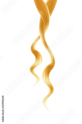 Blond hair on white background, isolated. Thin curly threads