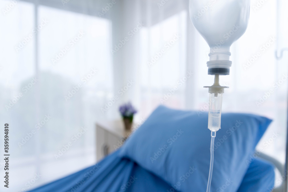 IV or Intravenous drip was provide for patient in hospital room. Medical healthcare concept. IV or Intravenous drip was provide for patient in hospital room. Medical healthcare concept.