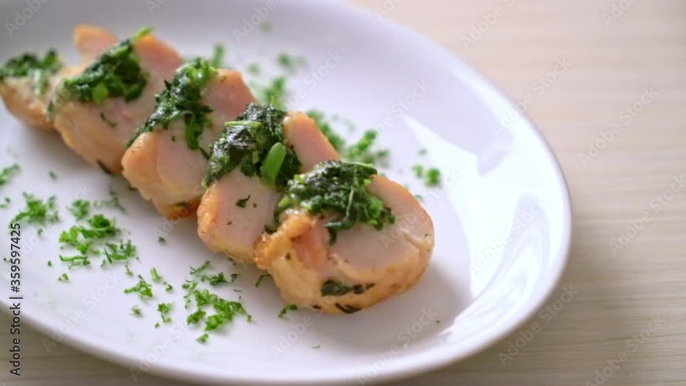 Chicken breasts stuffed with spinach and cheese on plate Chicken breasts stuffed with spinach and cheese on plate