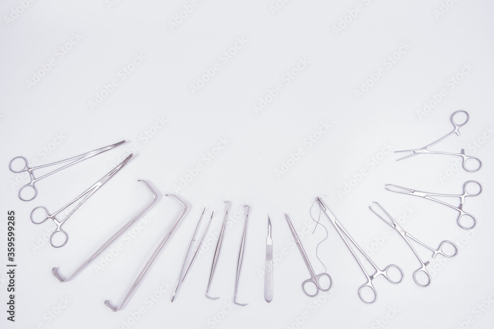 Surgical instruments on white background,top view Surgical instruments on white background,top view