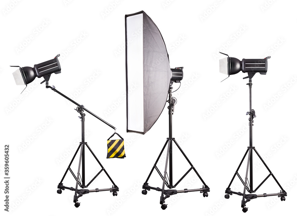 Photo studio lighting stands with flash and softbox isolated on the white. Photo studio lighting stands with flash and softbox isolated on the white.