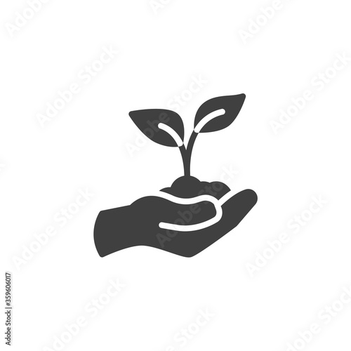 Hand holding plant with leaves vector icon. filled flat sign for mobile concept and web design. Hand with sprout glyph icon. Symbol, logo illustration. Vector graphics © alekseyvanin