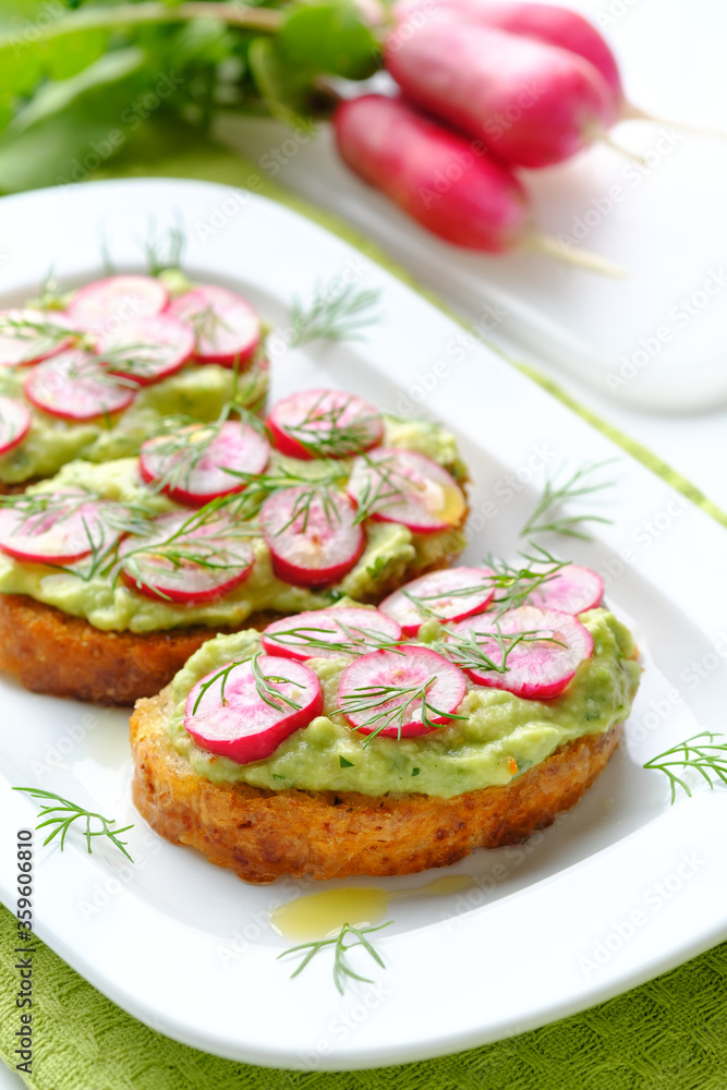 Delicious vegan sandwiches with radish and avocado Delicious vegan sandwiches with radish and avocado