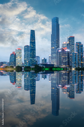 Guangzhou city skyline and architectural reflections at night,China.