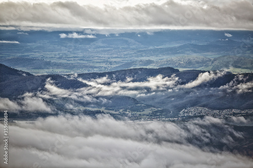 Low cloud and fog hugging the valleys and hilltops on a cold winter day in Hobart Tasmania © Steve Lovegrove