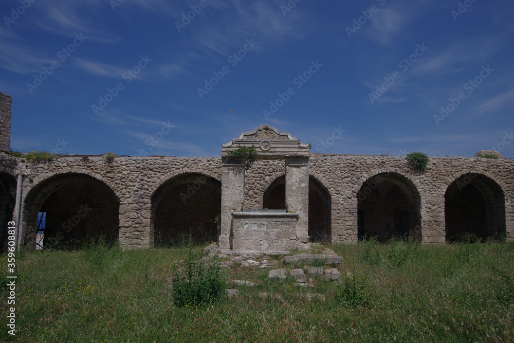 The cloister of the monastery and in the center the ancient well.
  San Nicola Island - Tremiti Islands - Adriatic Sea - Italy