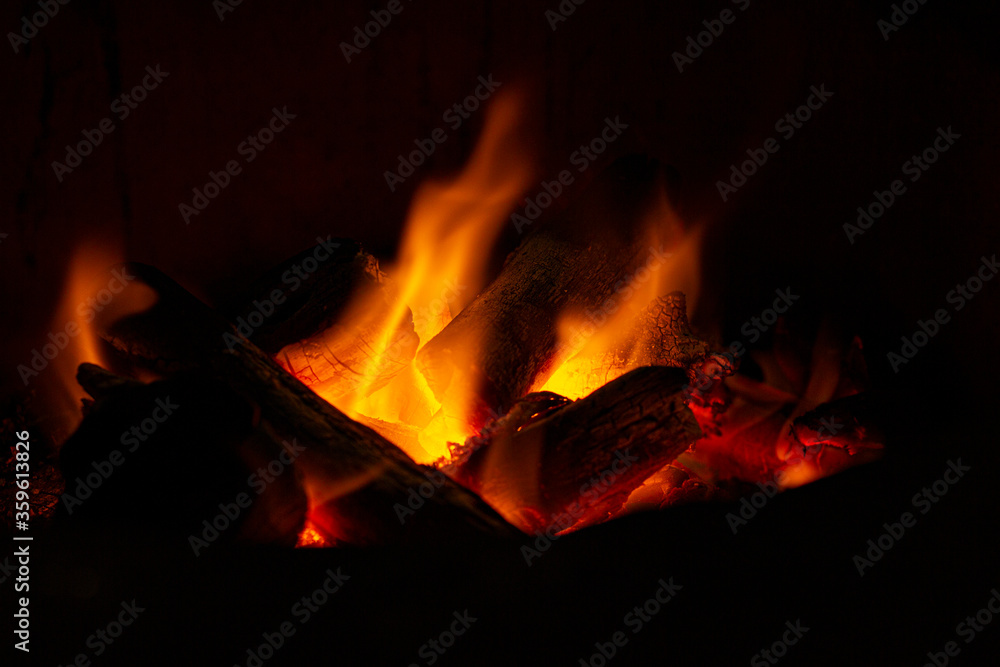 Fototapeta premium Empty Charcoal grill with open fire light at night