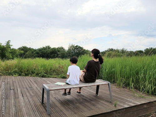 young couple sitting on bench