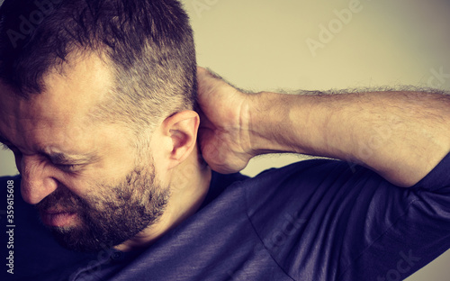 Man having neck ache