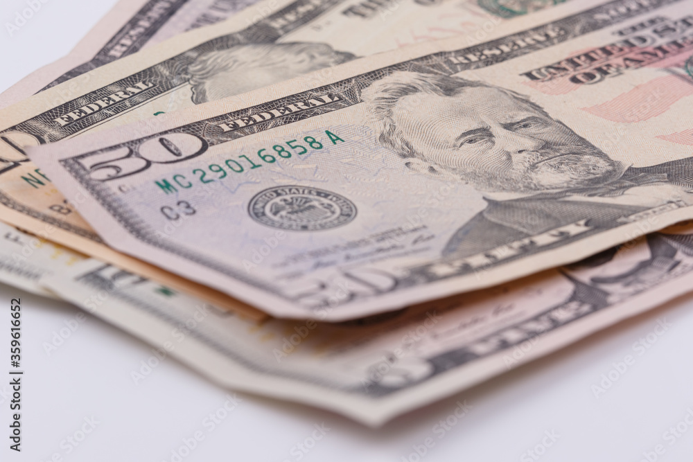 The texture of US dollars. Background from dollar bills. The texture of US dollars. Background from dollar bills.