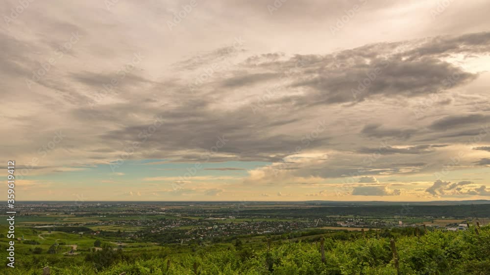 Sun setting over rural zone. Rain clouds moving. Viewed from the nearby hill. timelapse Sun setting over rural zone. Rain clouds moving. Viewed from the nearby hill. timelapse