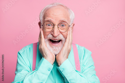 Closeup photo of funky crazy grandpa hands on cheeks look discount low shopping prices wear specs mint shirt suspenders bow tie isolated bright pink pastel color background