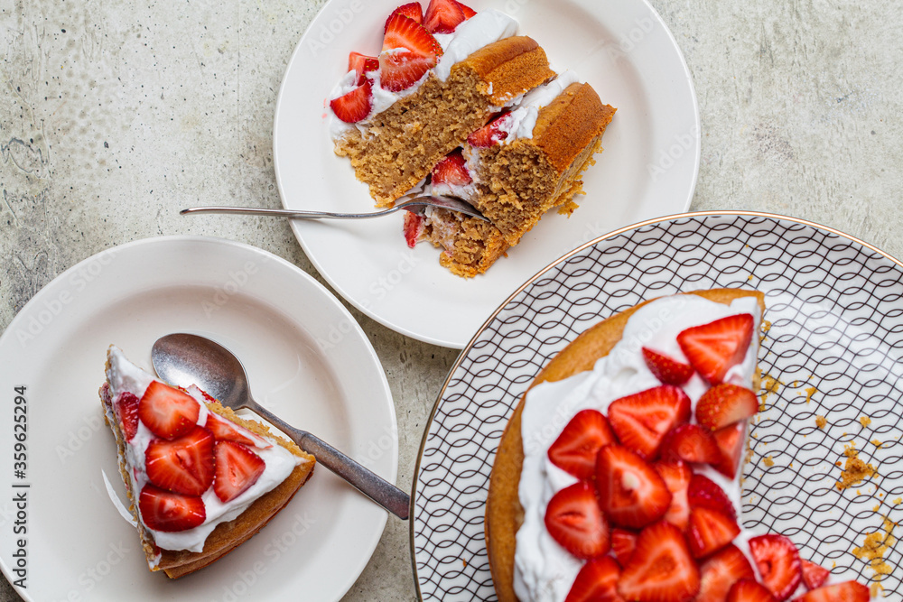 Flat lay of berry cake, top view. Vegan Strawberry Cake with Coconut Cream. Plant based dessert concept. Flat lay of berry cake, top view. Vegan Strawberry Cake with Coconut Cream. Plant based dessert concept.