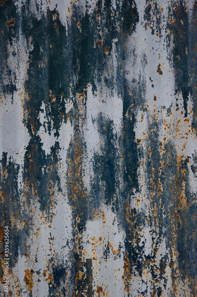 Fototapeta premium Old shabby paint with a blue tint on a metal background